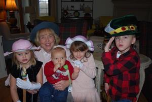 Gail Vick and four of her grandchildren enjoy her annual Grandma Christmas Tea Party. 